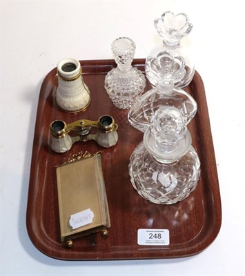Lot 248 - Four glass scent bottles, gilt metal picture frame, mother of pearl opera glasses, and an ivory eye