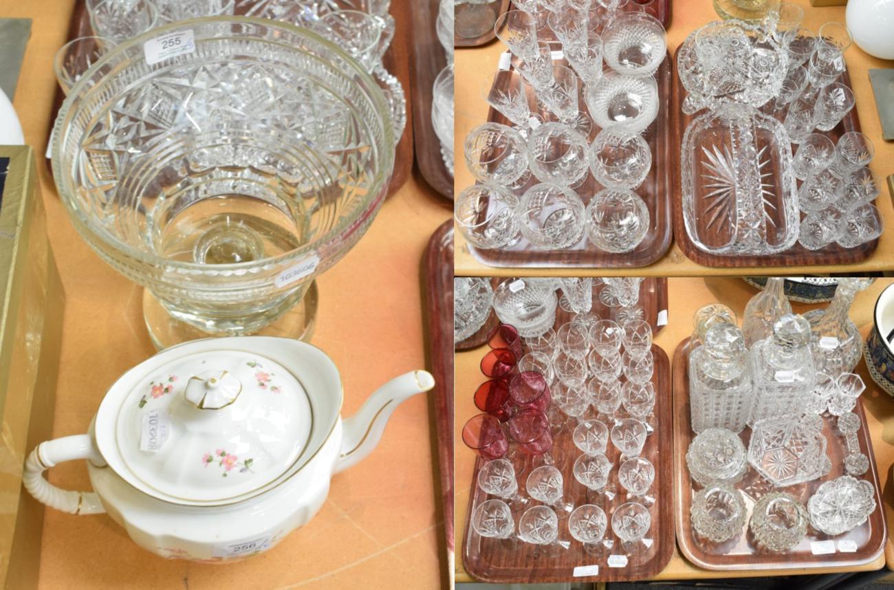 Lot 255 - Four trays including crystal decanters with stoppers, knife rests, assorted drinking glasses...