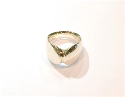 Lot 263 - A contemporary silver ring by George Jensen, of plain polished form, numbered 100, finger size L1/2