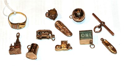 Lot 270 - A 9 carat gold T-bar; four 9 carat gold charms including a football and a boot; two charms...