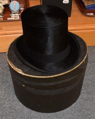Lot 294 - Silk top hat by G A Dunn & co Piccadilly circus London, with cardboard hat box and a military brass
