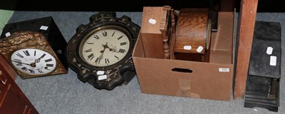 Lot 349 - A Victorian black slate mantel clock; three other mantel clocks; a French wall clock Le Govic Fils