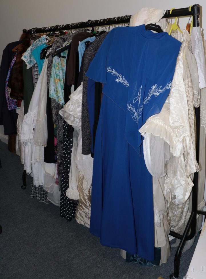Lot 371 - Rail of assorted circa 1960s and later mainly ladies clothing, including wedding dresses,...