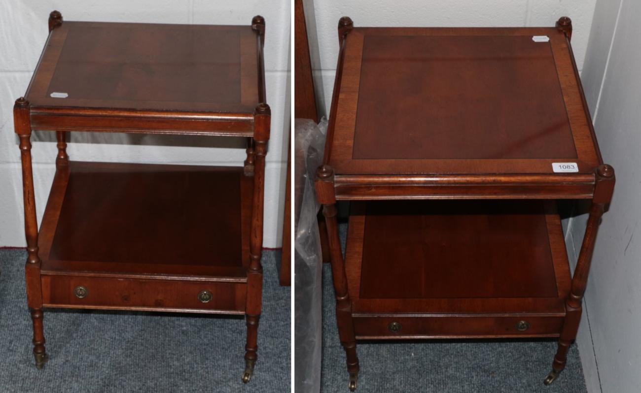 Lot 1083 - A pair of reproduction mahogany and crossbanded two tier tables, each with a single drawer and...