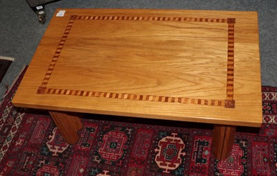 Lot 1087 - Chris Tribe Furniture: a blond oak and parquetry decorated coffee table, modern, of rectangular...