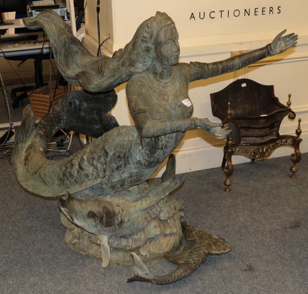 Lot 1103 - A large copper garden water feature in the form of a mermaid, 117cm high