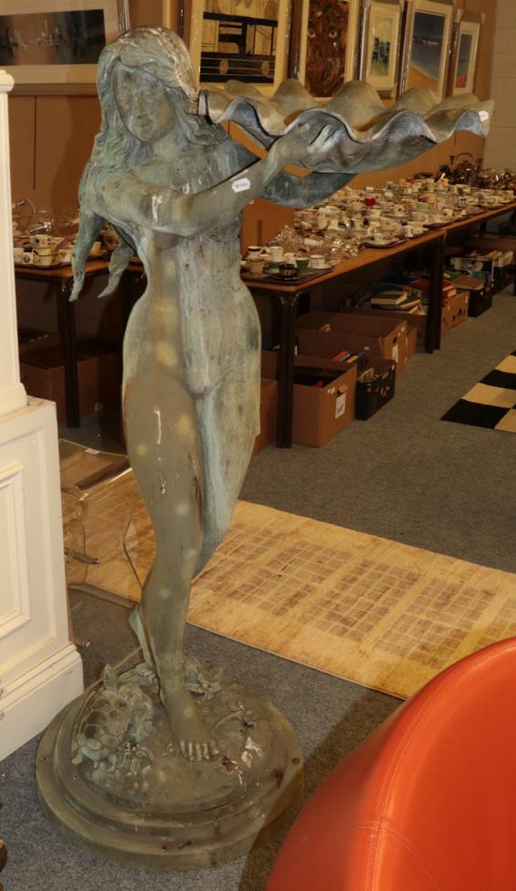 Lot 1104 - A large figural copper garden water feature in the form of a maiden, 160cm high
