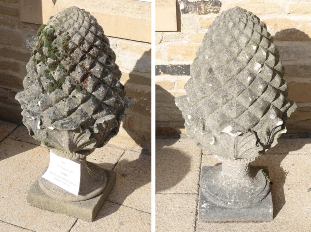 Lot 1107 - A pair of large weathered composition artichoke finials (a.f.)