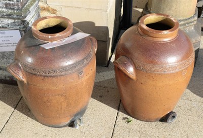 Lot 1115 - A large pair of Doulton stoneware jars