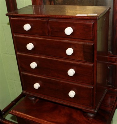 Lot 1137 - ^ A Victorian mahogany miniature five drawer straight fronted chest of drawers, 40cm wide