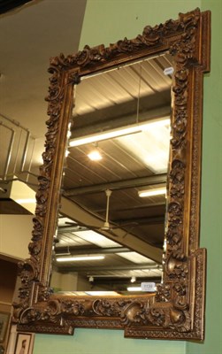 Lot 1139 - A 19th century gilt and gesso glass mirror