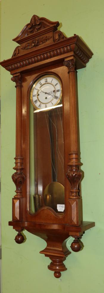 Lot 1142 - A Vienna type quarter striking wall clock
