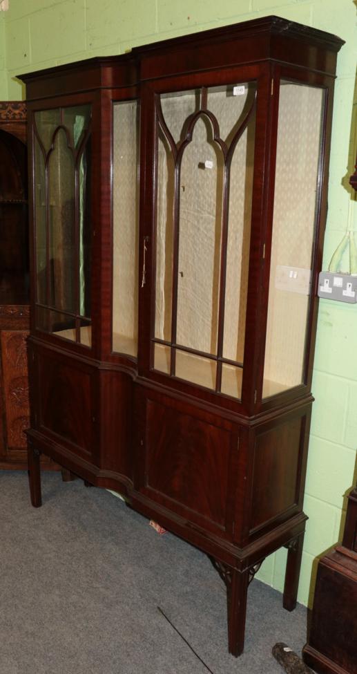 Lot 1145 - An early 20th century mahogany double door display cabinet