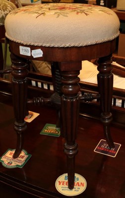 Lot 1160 - ^ An early 19th century mahogany adjustable piano stool on reeded legs, minimum height 50cm
