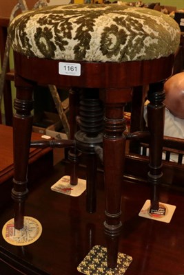 Lot 1161 - ^ A Regency mahogany adjustable piano stool on turned legs, minimum height 50cm