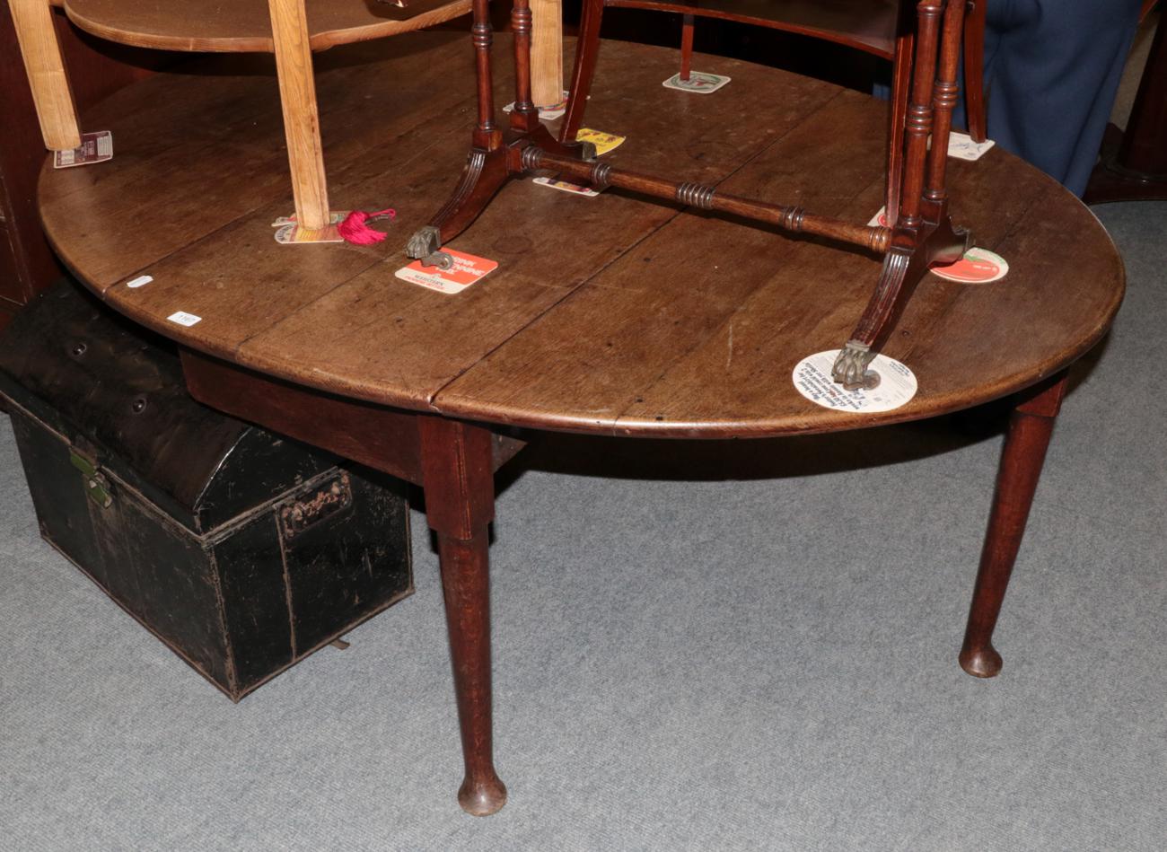 Lot 1167 - An 18th century pad foot dining table