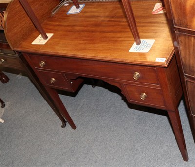 Lot 1180 - ^ A 19th century mahogany dressing table, with a three-quarter top gallery, 90cm wide