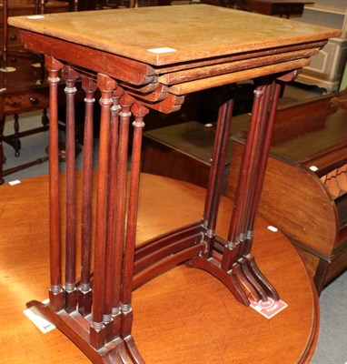 Lot 1182 - ^ A quartetto of mahogany and satinwood banded nesting tables, the largest 50cm wide