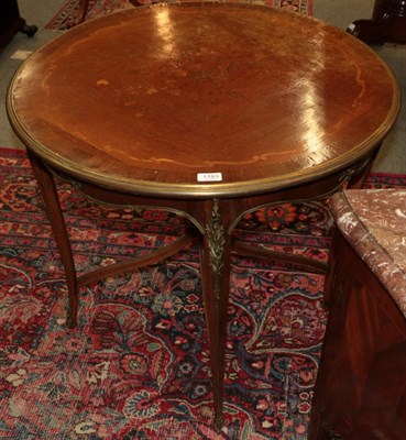 Lot 1183 - A late 19th century rosewood, crossbanded, marquetry inlaid and gilt metal mounted circular...