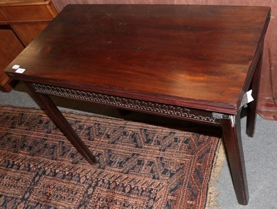 Lot 1192 - A George III mahogany fold over tea table