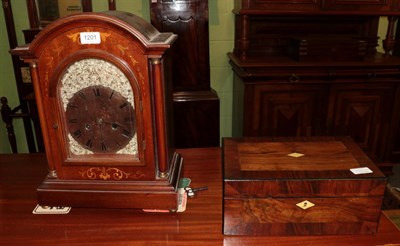 Lot 1201 - An Edwardian mahogany marquetry inlaid table clock later dial, together with a crossbanded rosewood