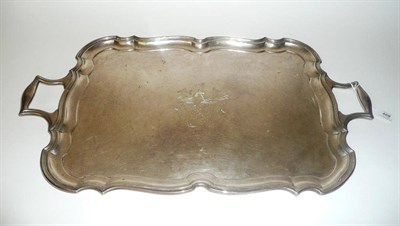 Lot 469 - A George V Tray, Barker Bros Ltd, Birmingham 1930, rectangular with waved scroll rim and...