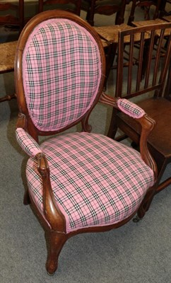 Lot 1205 - A 19th century walnut framed open armchair, recovered in pink tartan fabric