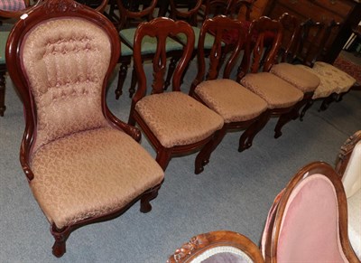 Lot 1207 - A Victorian mahogany framed nursing chair, a set of four Victorian dining chairs upholstered to...