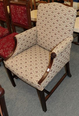 Lot 1217 - George III style elbow chair with floral fabric