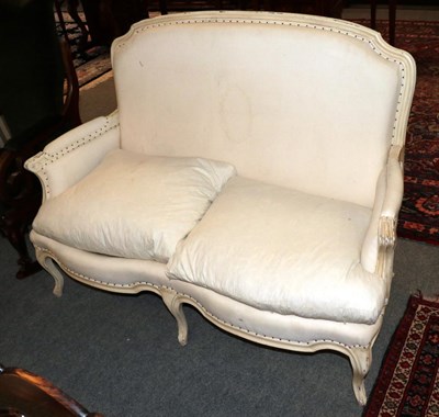 Lot 1219 - French style cream painted two seater sofa