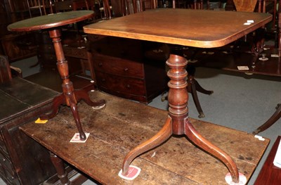 Lot 1230 - ^ A George III mahogany flip top circular tripod table, 73cm high; and a Regency mahogany flip...