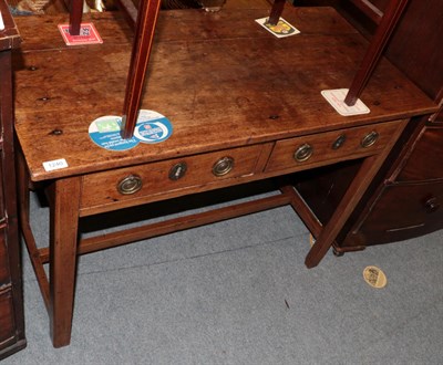 Lot 1240 - A George III mahogany two drawer side table, 102cm wide