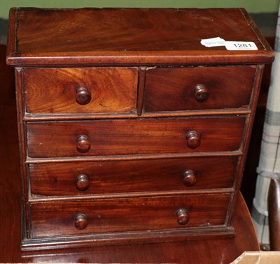Lot 1281 - A 19th century mahogany miniature four height chest of drawers