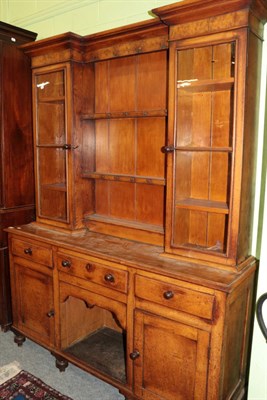 Lot 1290 - An early 19th century oak farmhouse kitchen dresser with glazed doors, 159cm wide