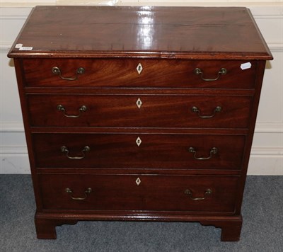 Lot 1293 - George III mahogany four drawer chest, moulded top, 79cm diameter