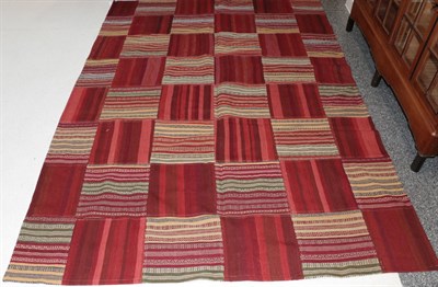 Lot 1300 - Modernist Handwoven ''Pakh'' Rug, probably North Afghanistan, the field of polychrome panels of...
