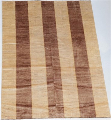 Lot 1304 - Modernist Hand-Knotted Carpet, North Afghanistan, the field with columns of wide bands, 305cm...