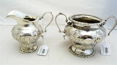 Lot 488 - A Victorian Sugar Bowl and Cream Jug, John Hunt, London 1898, the gadrooned spreading bases...