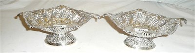 Lot 494 - A Pair of Victorian Dessert Bowls, Charles Edwards, London 1893, the oval pedestal base chased with