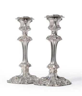 Lot 501 - A Pair of Victorian Candlesticks, Henry Wilkinson & Co, Sheffield 1855, the leaf capped shaped...