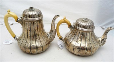 Lot 509 - A Victorian Teapot and Coffee Pot, Robert Garrard, London 1849, of pear shaped with alternating...