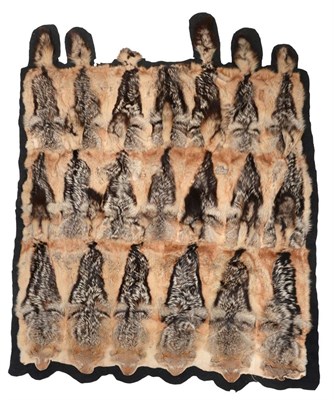 Lot 289 - Taxidermy: Black-Backed Jackal Carriage/Car Rug (Canis mesomelas), a large patchwork carriage...