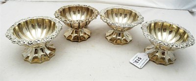 Lot 513 - A Matched Set of Four George IV Pedestal Salts, Emes & Barnard, London, possibly 1826, of melon...