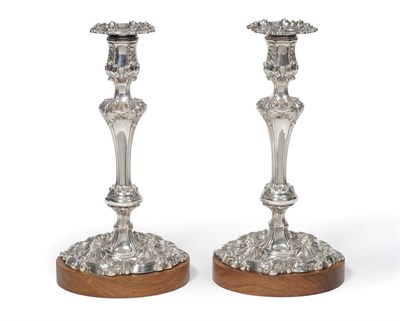 Lot 519 - A Pair of George III Candlesticks, Kirkby, Waterhouse & Co, Sheffield 1813, the shaped circular...