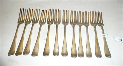 Lot 521 - A Set of Twelve George III Irish Table Forks, Samuel Neville, Dublin 1801, retailer's mark for...