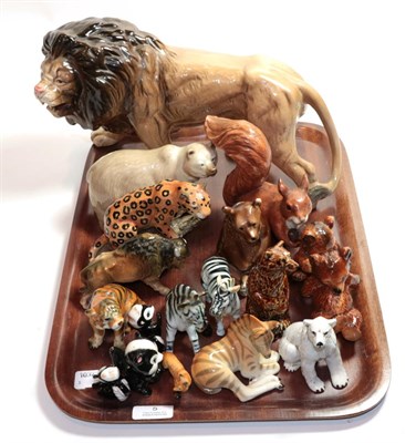 Lot 5 - A collection of wild animals including Melba Ware lion and various other animal models