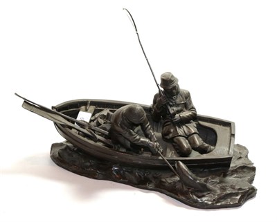 Lot 9 - A Heredities bronzed resin figure group of two men, salmon fishing in a rowing boat named...