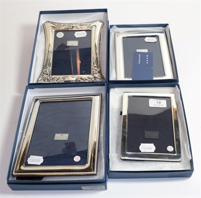 Lot 19 - Four Elizabeth II silver photograph frames by Carrs, Sheffield, two 2010 and two 2011, each...