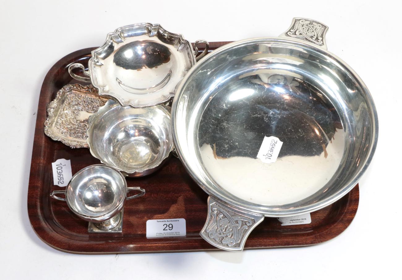 Lot 29 - Four silver items including: an Edward VII two-handled pedestal bowl; by William Comyns,...