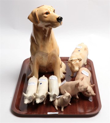 Lot 42 - A collection of Beswick animals to include a Labrador; a bull and three pigs; and three Aynsley...